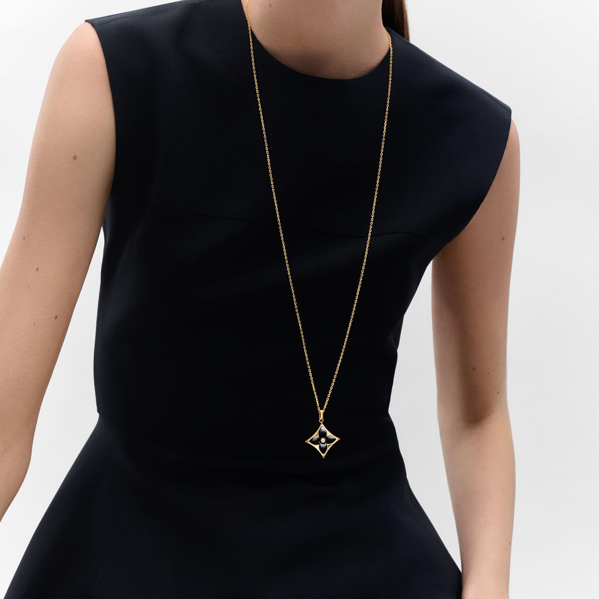  Categories Necklaces and Pendants  Color Blossom XL Star Medallion, Yellow Gold, Onyx and Diamond | Louis Vuitton ® (Product zoom)