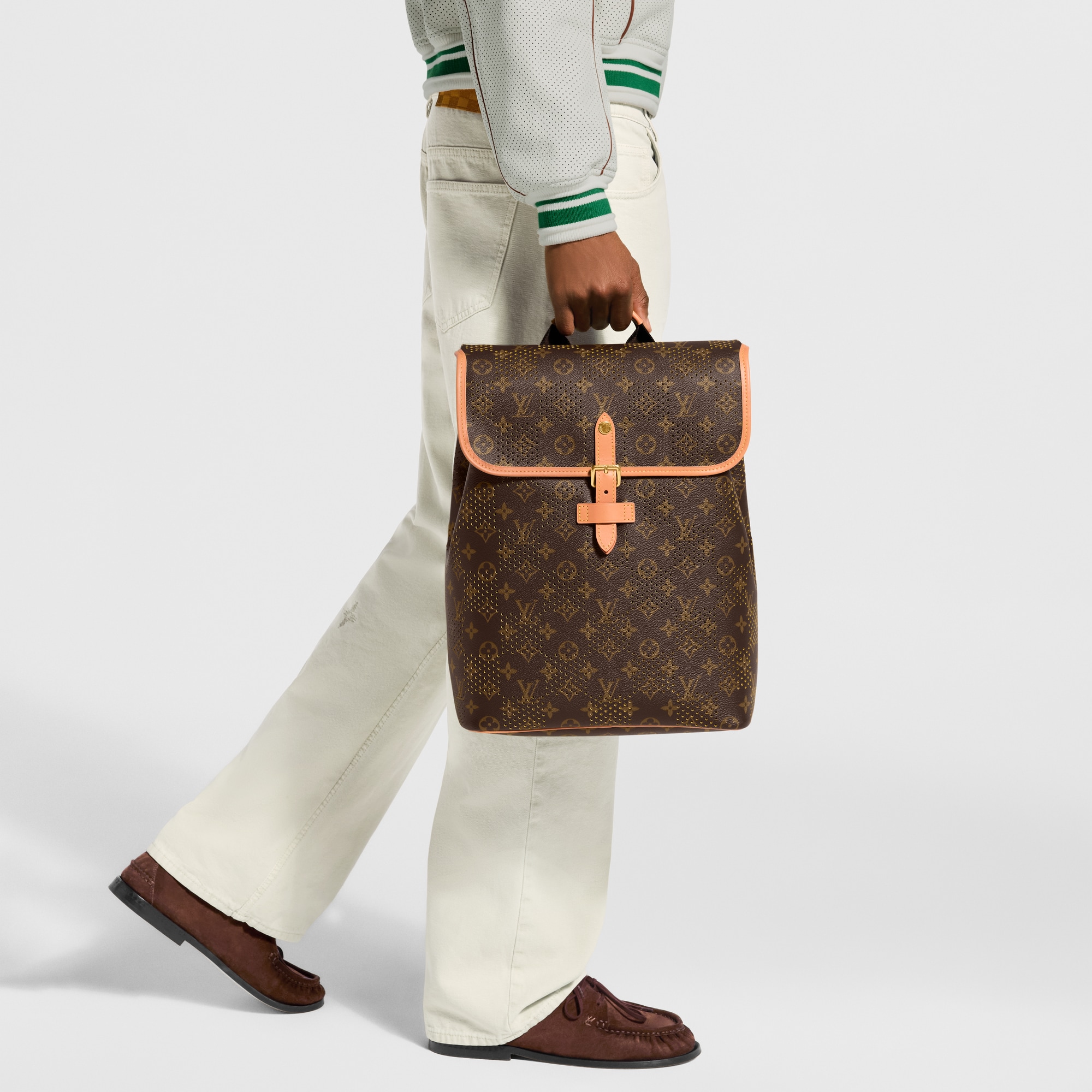 louis vuitton backpack with cloth straps Vintage Monogram Montsouris MM Brown The sleek flaneur backpack in monogram grid canvas features a myriad of tiny perforations creating a damier checkerboard Louis Vuitton Backpack monogram