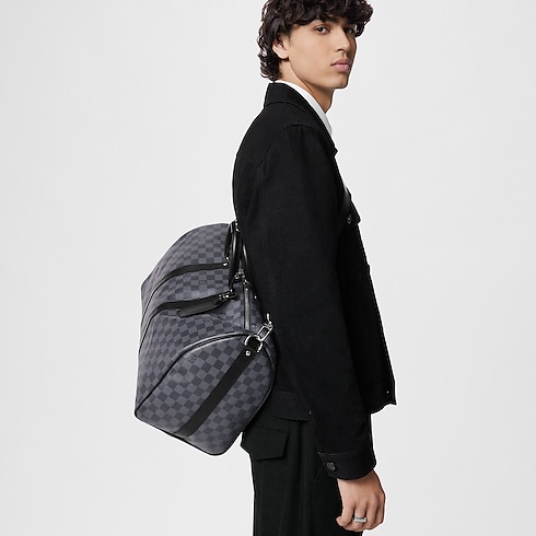Damier Graphite Canvas Travel All Luggage and Accessories Keepall Bandoulière 45 | Louis Vuitton ® (Product zoom)