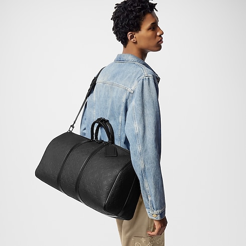 Monogram Taurillon Leather Travel Bags and Rolling Luggage Travel Bags Keepall Bandoulière 50 | Louis Vuitton ® (Product zoom)
