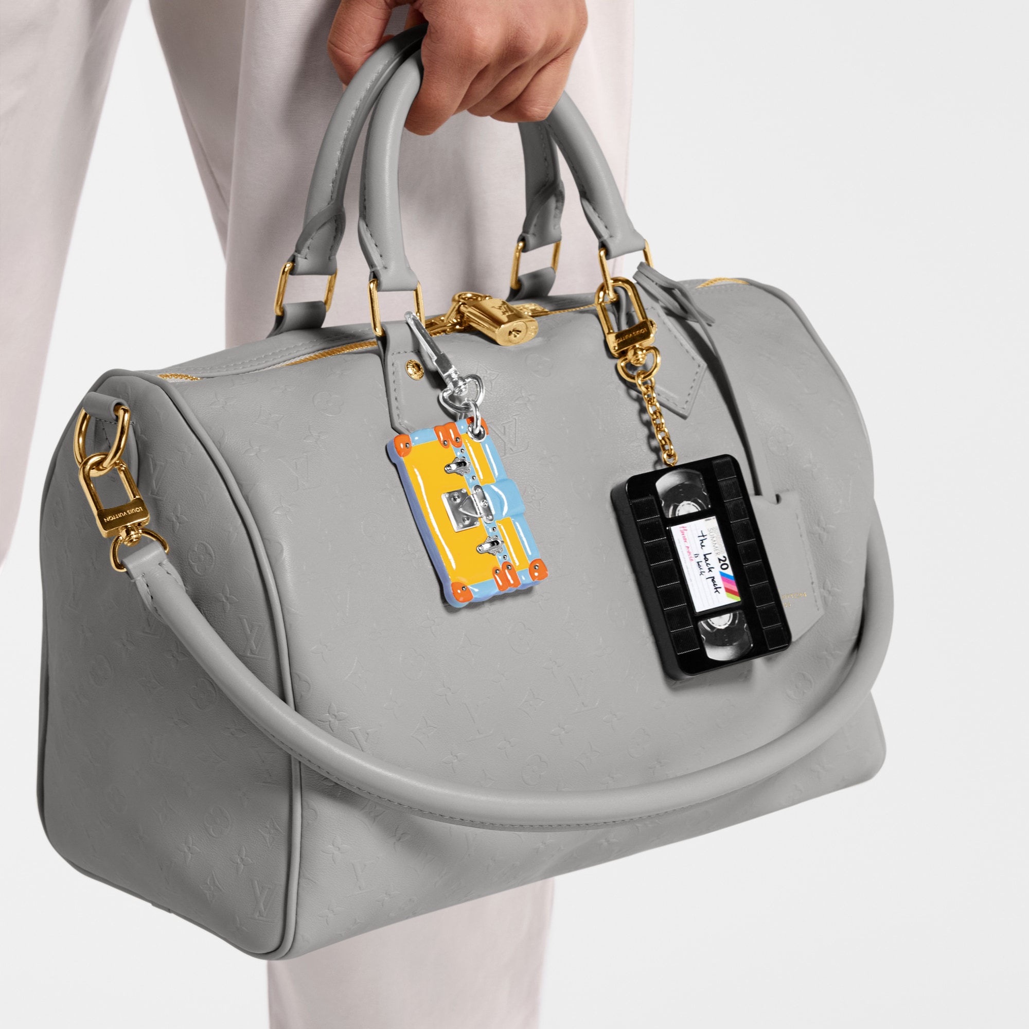 S00 Accessories Key Holders and Bag Charms LV Record Bag Charm | Louis Vuitton ® (Product zoom)