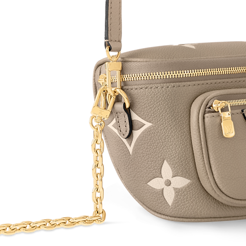 Bicolor Monogram Empreinte Leather Small Leather Goods Wallets on Chain and Nano Bags Mini Bumbag | Louis Vuitton ® (Product zoom)
