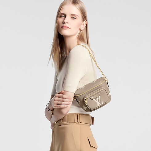 Bicolor Monogram Empreinte Leather Small Leather Goods Wallets on Chain and Nano Bags Mini Bumbag | Louis Vuitton ® (Product zoom)