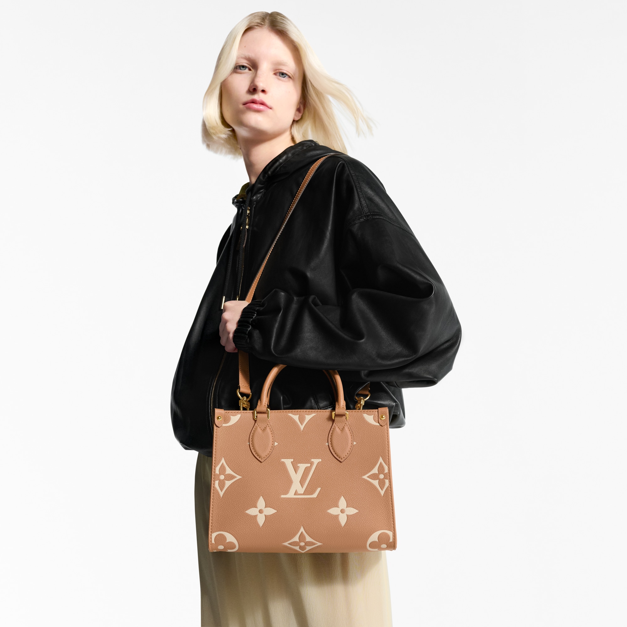 Bicolor Monogram Empreinte Leather Handbags All Collections OnTheGo PM | Louis Vuitton ® (Product zoom)
