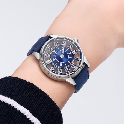 Tambour Spin Time Air, Automatic, 42.5mm, White gold Ambiance View